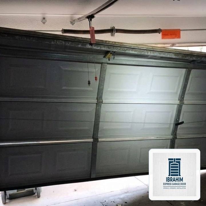 Ibrahim Express Garage Door in Jersey Village, TX: Heavy-Duty Steel Section Strut & 11-Gauge Hinge Reinforcement - Jersey Village, TX